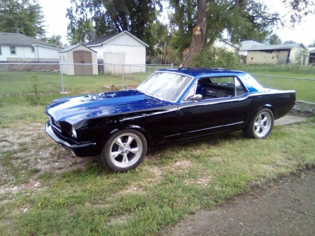1966 Super jet black on bottom on bottom and impulse blue on top Ford Mustang Coupe