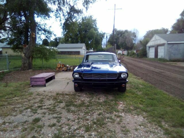 1966 Super jet black on bottom on bottom and impulse blue on top Ford Mustang Coupe