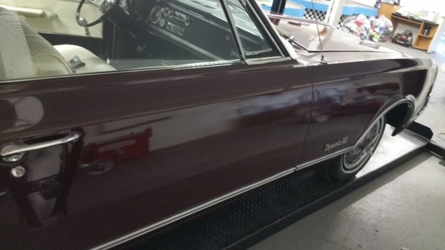 1966 Burgundy Oldsmobile Eighty-Eight Convertible