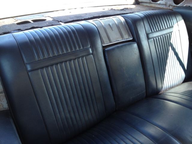 1966 white Pontiac Grand Prix Coupe