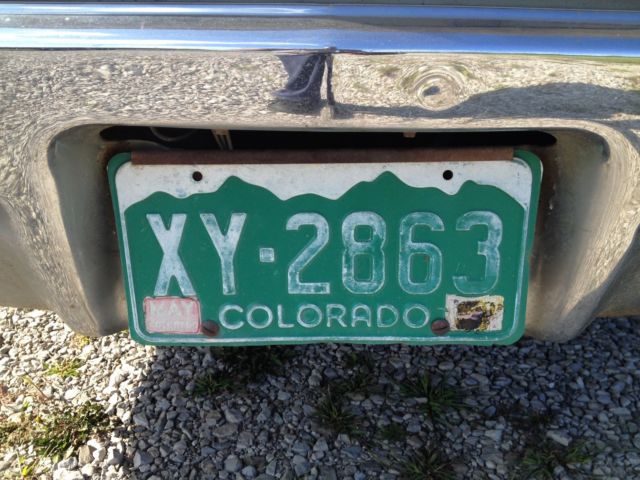 1966 white Pontiac Grand Prix Coupe