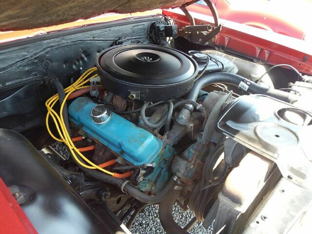 1966 Red Pontiac GTO --