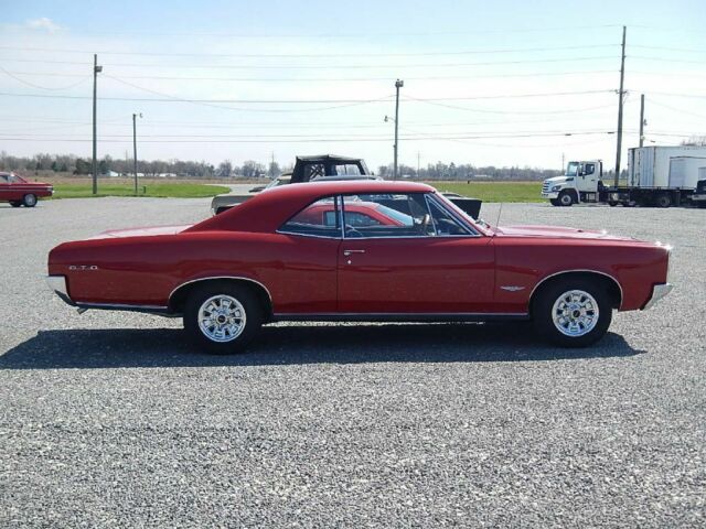 1966 Red Pontiac GTO --