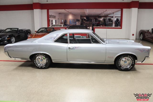 1966 Gray Pontiac GTO Post