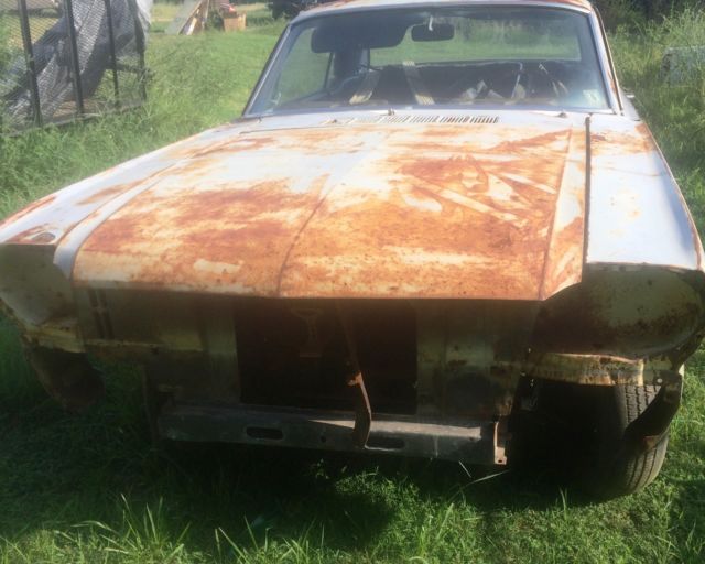 1966 Primer black and yellow Ford Mustang 2 door coupe