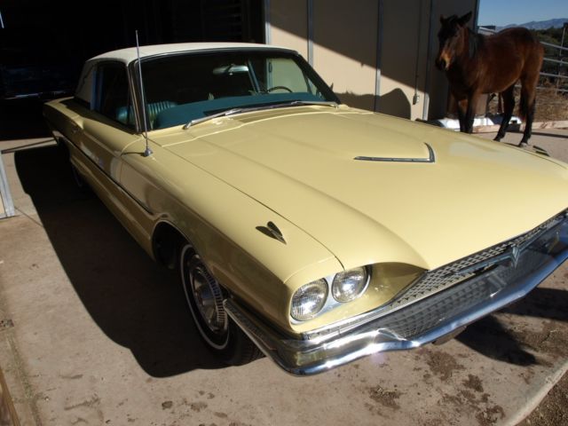 1966 yellow Ford Thunderbird