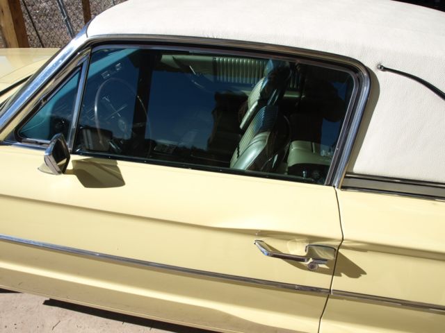 1966 yellow Ford Thunderbird