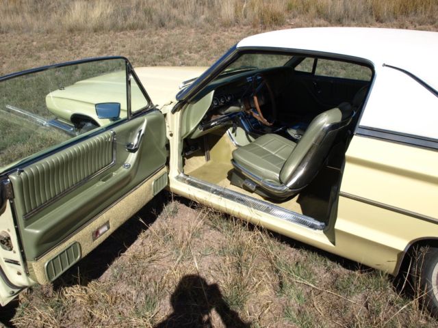 1966 yellow Ford Thunderbird