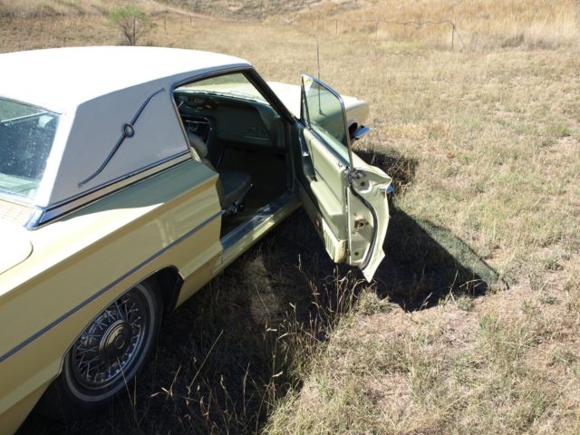 1966 yellow Ford Thunderbird