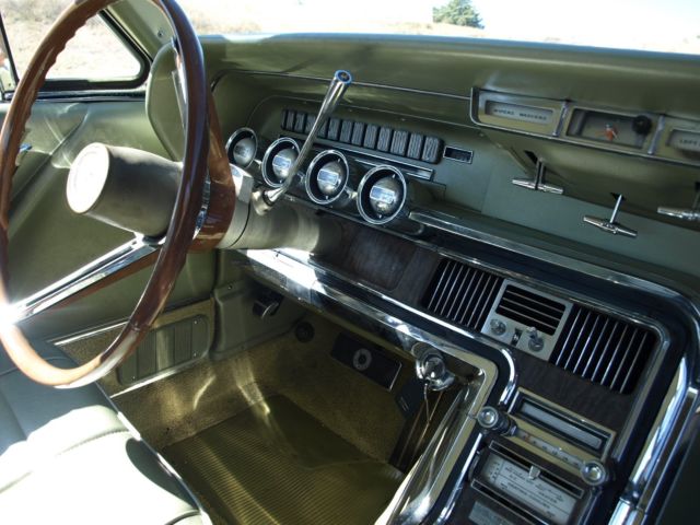 1966 yellow Ford Thunderbird