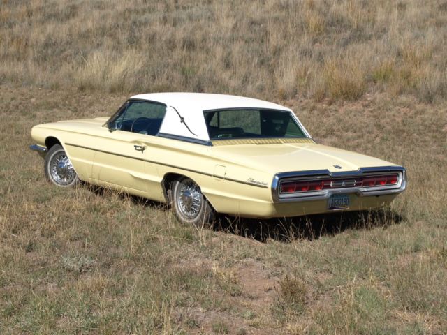 1966 yellow Ford Thunderbird