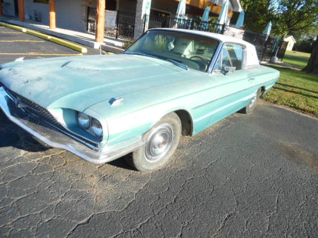 1966 green Ford Thunderbird