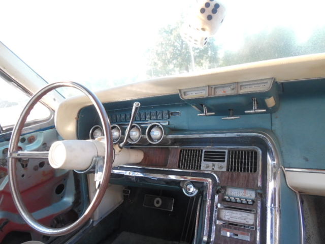 1966 green Ford Thunderbird