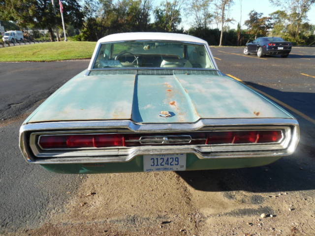 1966 green Ford Thunderbird