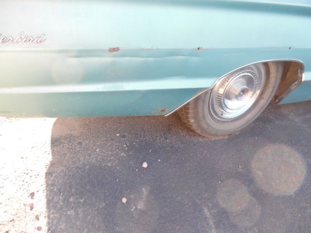 1966 green Ford Thunderbird