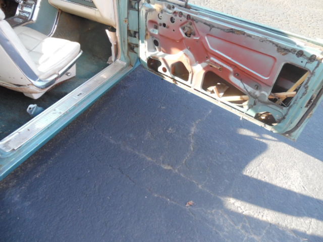 1966 green Ford Thunderbird