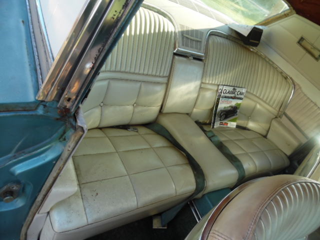 1966 green Ford Thunderbird