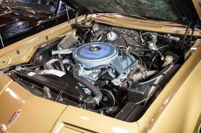 1966 Trumpet Gold Oldsmobile Toronado
