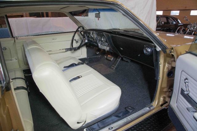 1966 Trumpet Gold Oldsmobile Toronado