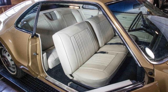 1966 Trumpet Gold Oldsmobile Toronado