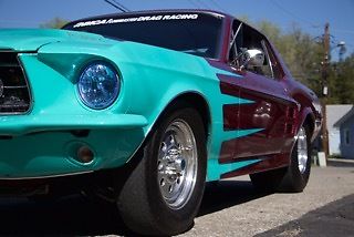1967 Turquoise and Plum Ford Mustang 2 door