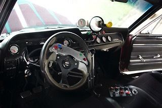 1967 Turquoise and Plum Ford Mustang 2 door