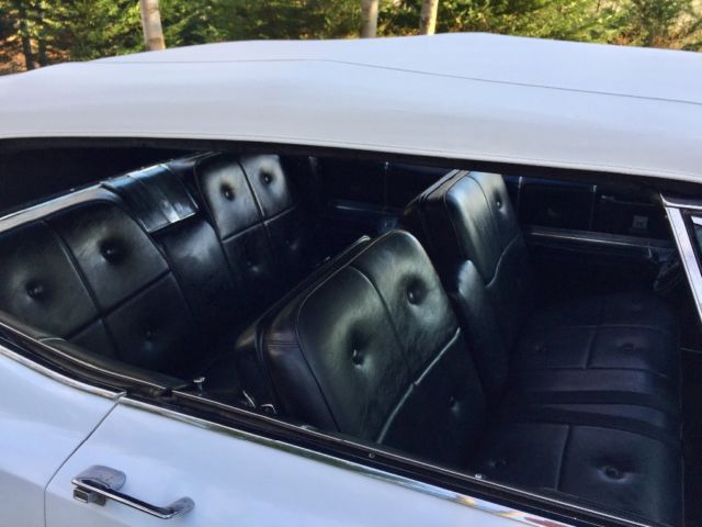 1967 White Cadillac DeVille Convertible