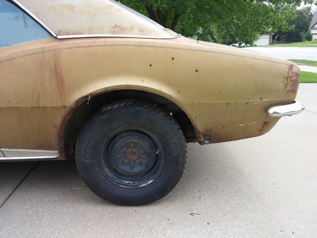 1967 marroon Chevrolet Camaro Hardtop