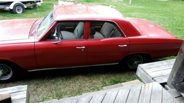 1967 Red Chevrolet Chevelle 4 door