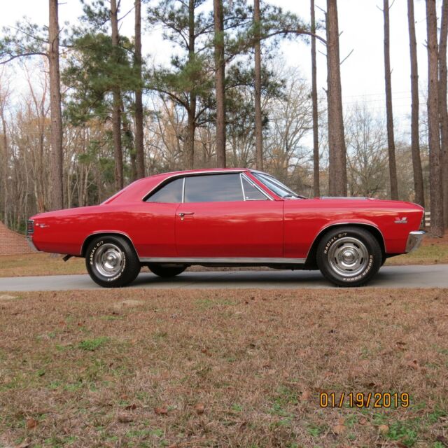 1967 red Chevrolet Chevelle Coupe