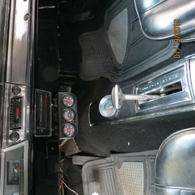 1967 red Chevrolet Chevelle Coupe