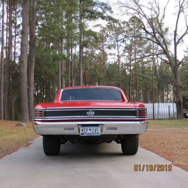 1967 red Chevrolet Chevelle Coupe
