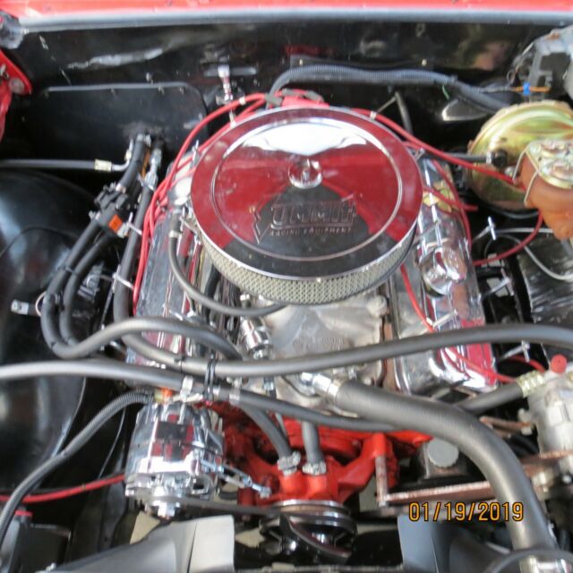 1967 red Chevrolet Chevelle Coupe