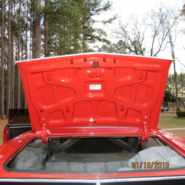 1967 red Chevrolet Chevelle Coupe