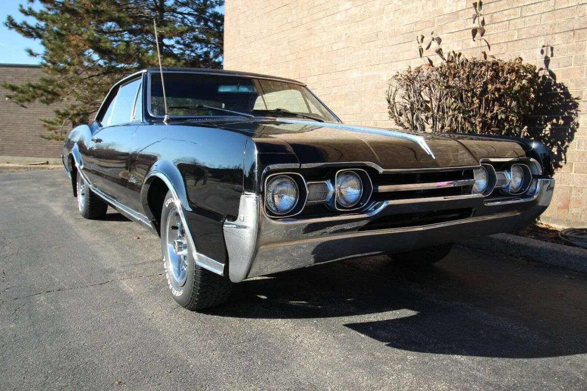 1967 Black Oldsmobile Cutlass Coupe