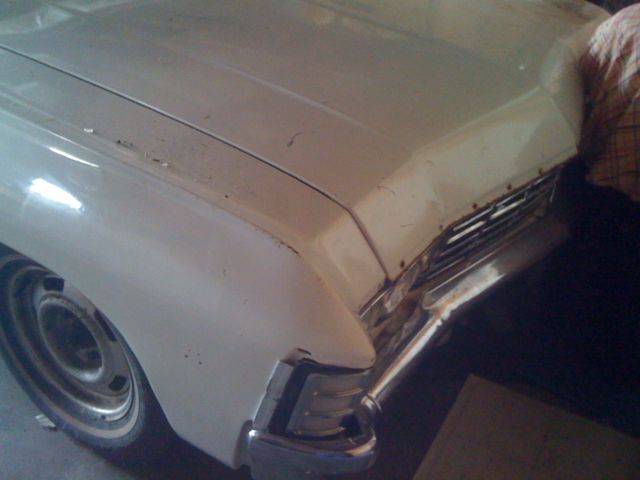 1967 Yellow Chevrolet Impala Convertible