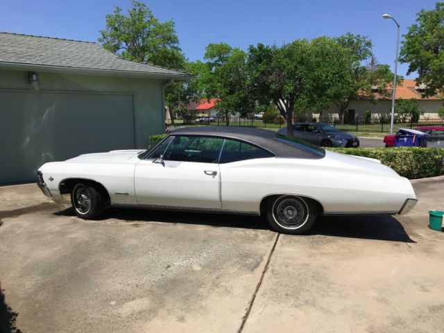 1967 White Chevrolet Impala
