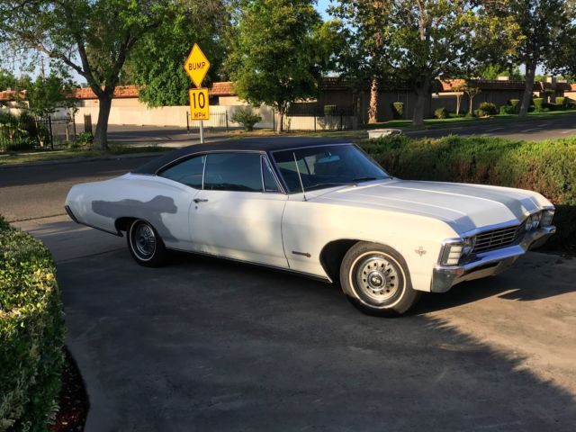 1967 White Chevrolet Impala