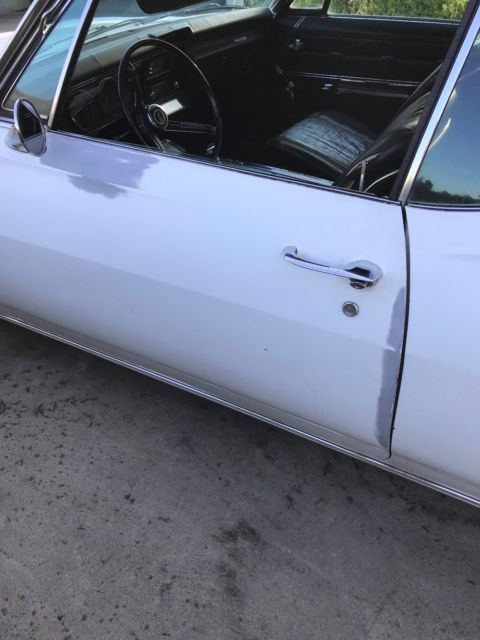 1967 White Chevrolet Impala