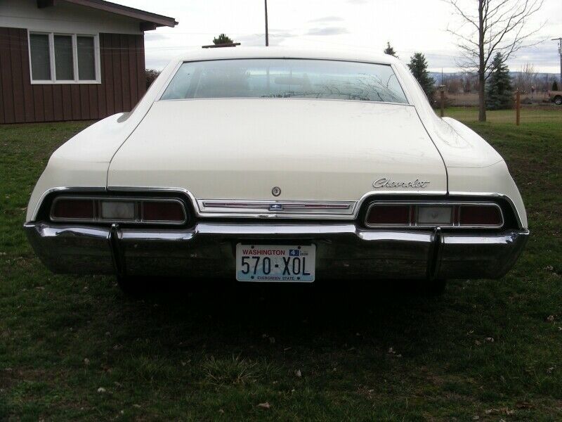1967 Cream Chevrolet Impala Sedan