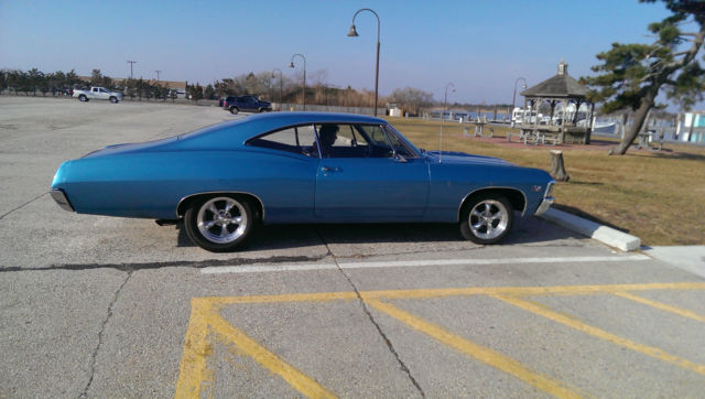 1967 marina blue Chevrolet Impala Fastback