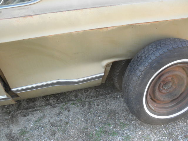 1967 gold Chrysler Newport coupe