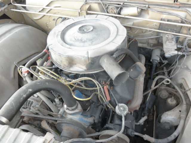 1967 gold Chrysler Newport coupe