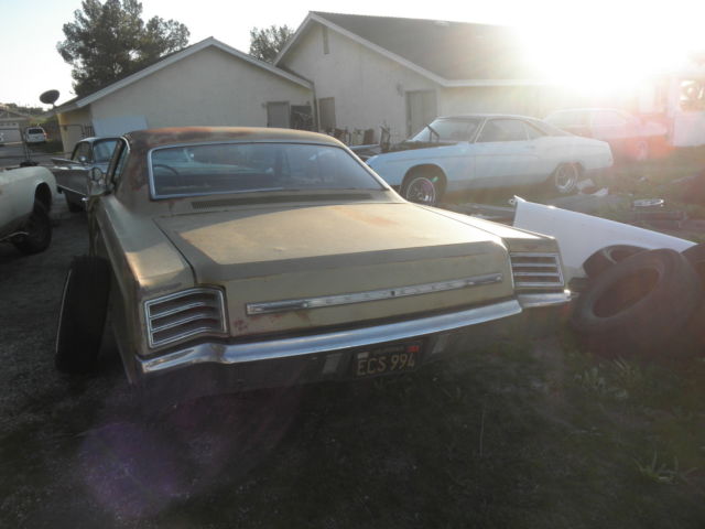 1967 gold Chrysler Newport coupe