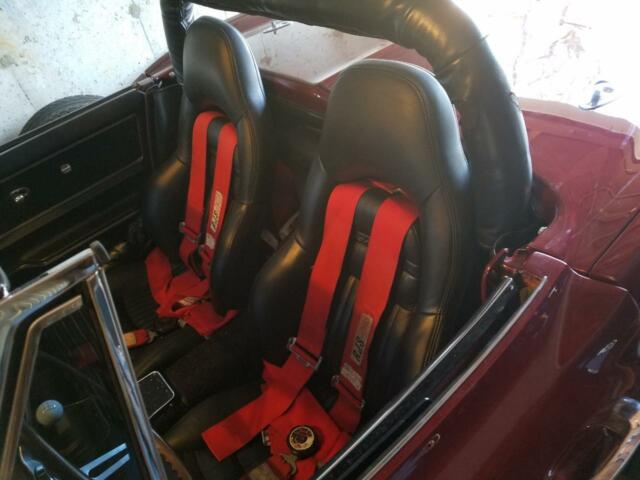 1967 maroon Chevrolet Corvette