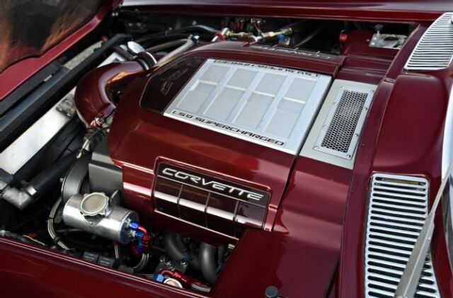 1967 maroon Chevrolet Corvette