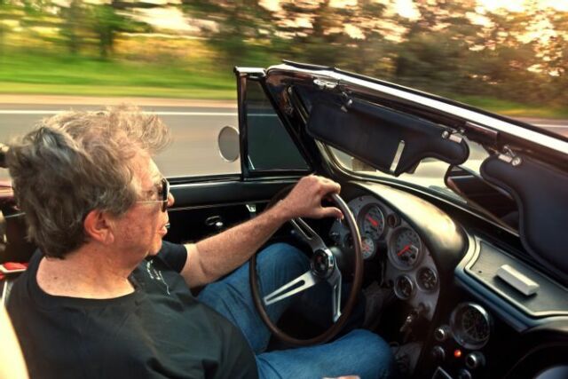 1967 maroon Chevrolet Corvette