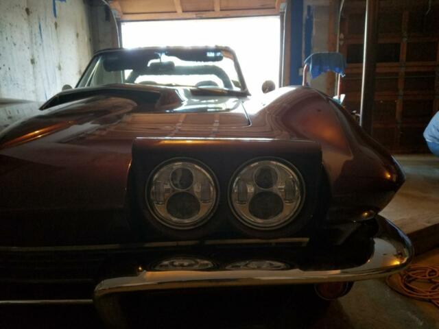 1967 maroon Chevrolet Corvette