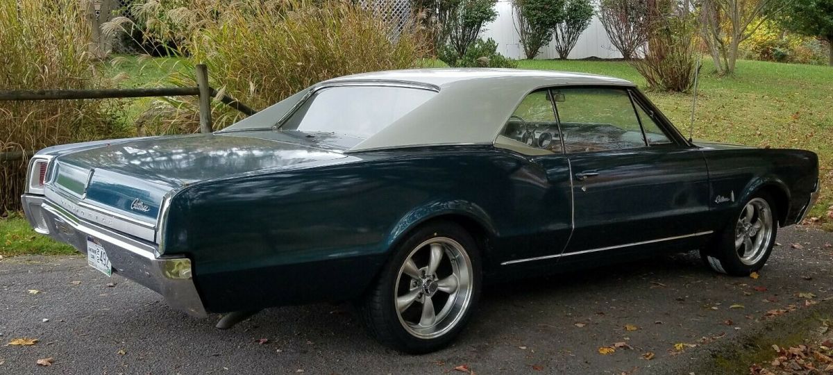 1967 Tahoe Turquoise / Provential White Oldsmobile Cutlass Coupe