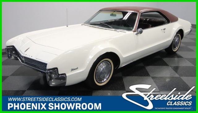 1967 White Oldsmobile Toronado